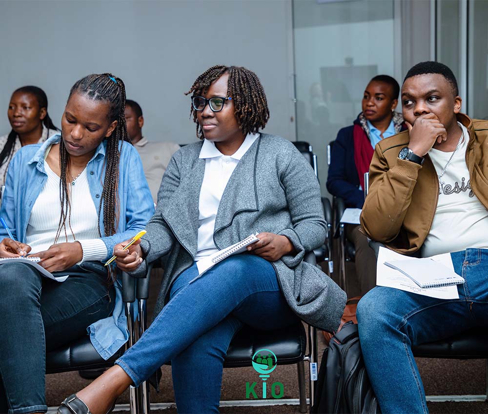 Young people listening during a KIO youth session